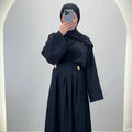 <tc>L</tc>une robe <tc>S</tc>noir